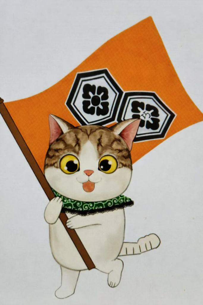 社旗をもつ小太郎